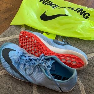 Women’s size 8 track shoes with spikes for sprint races.